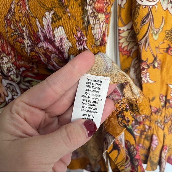 Conditions Apply Anthropologie Yellow Floral Smocked Peplum Blouse - Picture 5 of 5